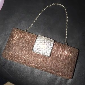 Red sparkly clutch and shoulder bag